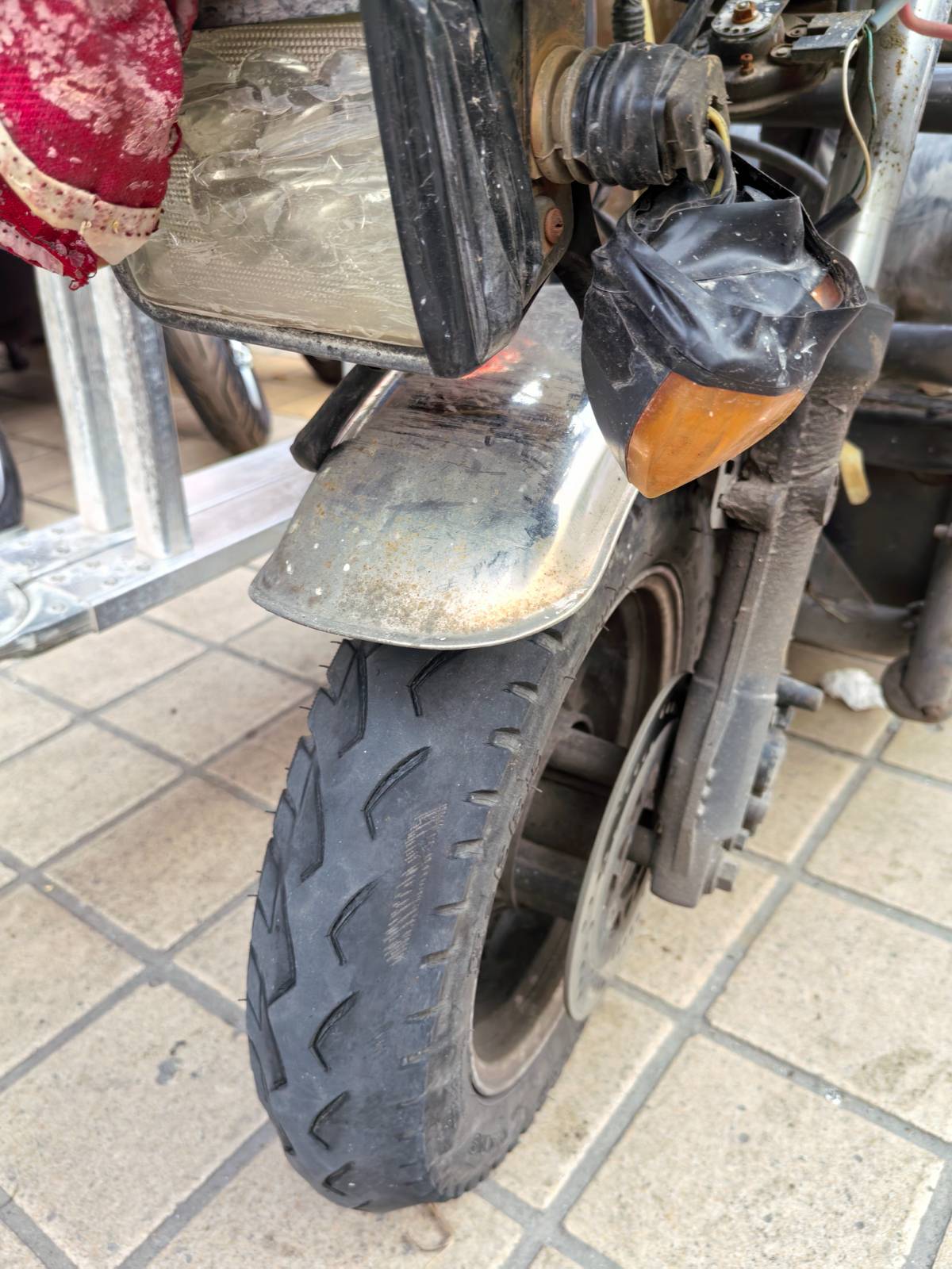街头修车摊记事:给“老伙计”续命,重启风雨同行的奔赴